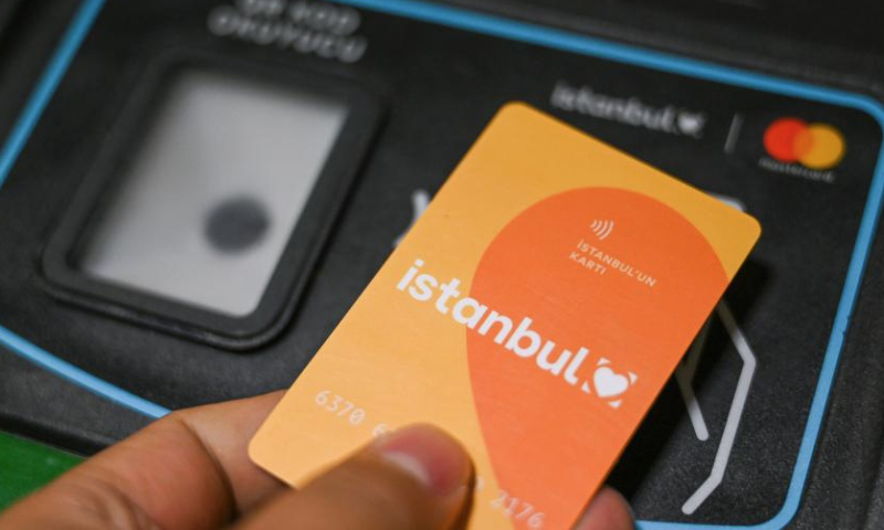 A passenger swipes his public transport card at a metro gate in Istanbul, Türkiye, Jan. 15, 2025. Authorities in Istanbul, Türkiye's largest city, will hike public transport and taxi fares by 35 percent, state-run Anadolu news agency said on Wednesday. (Xinhua/Liu Lei)