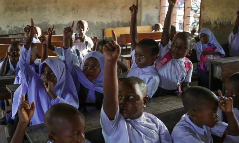Tanzanian first-grade pupils attend a class on their first day of school in Dar es Salaam, Tanzania, on Jan. 13, 2025. Tanzanian elementary school students marked the first day of school on Monday. (Xinhua/Emmanuel Herman)