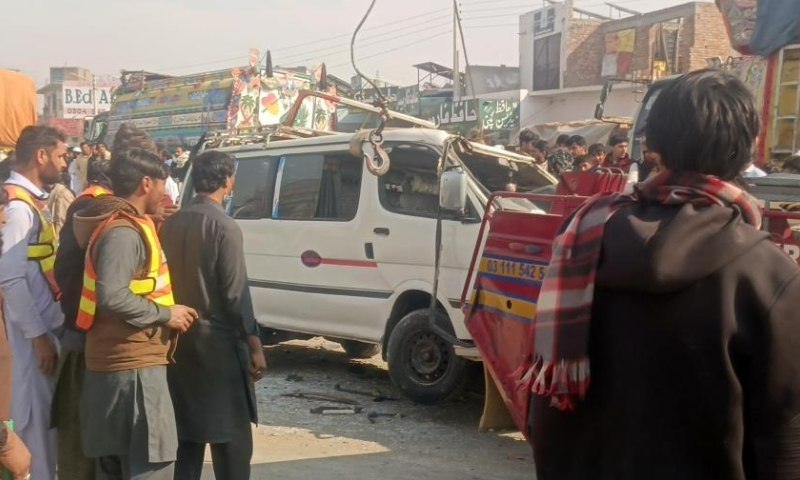 This photo taken with a mobile phone on Jan. 11, 2025 shows rescuers working at the site of a road accident in Karak district in Pakistan's northwest Khyber Pakhtunkhwa province. Twelve people were killed and 11 others injured in a road accident in Pakistan's northwest Khyber Pakhtunkhwa province on Saturday, rescue officials said. (Str/Xinhua)