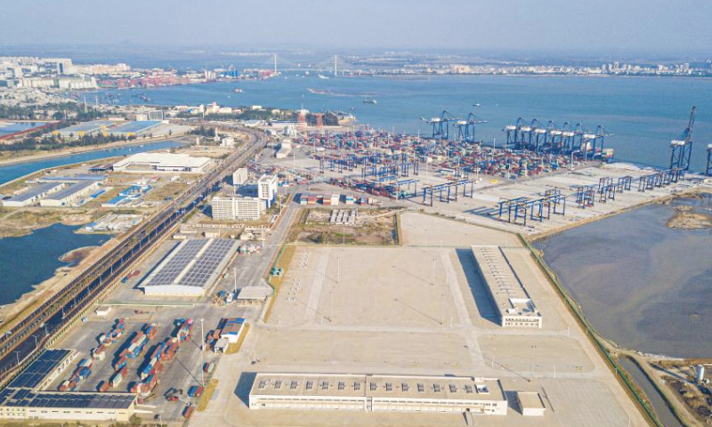 An aerial drone photo shows a construction site of a customs project of the Yangpu Port in the Yangpu Economic Development Zone in Danzhou, south China's Hainan Province, Jan. 12, 2025. (Xinhua/Pu Xiaoxu)