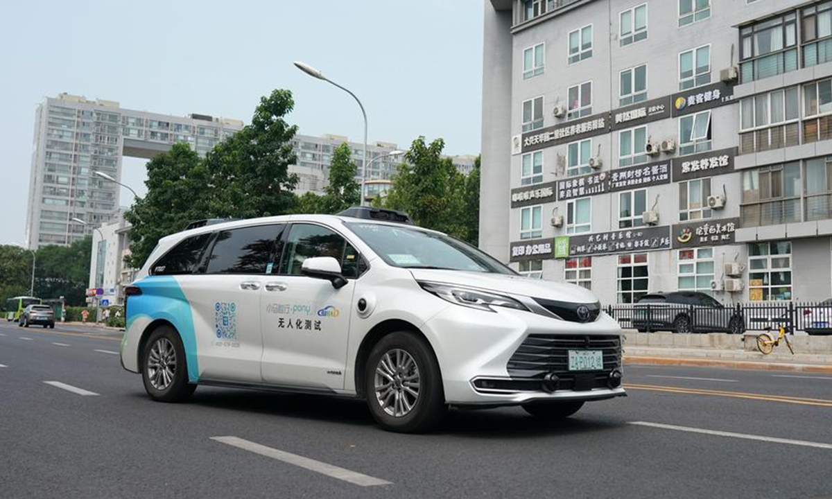 An autonomous vehicle undergoes road testing at an autonomous driving demonstration area in Yizhuang in Beijing, capital of China, June 19, 2024. (Xinhua/Zhang Chenlin)