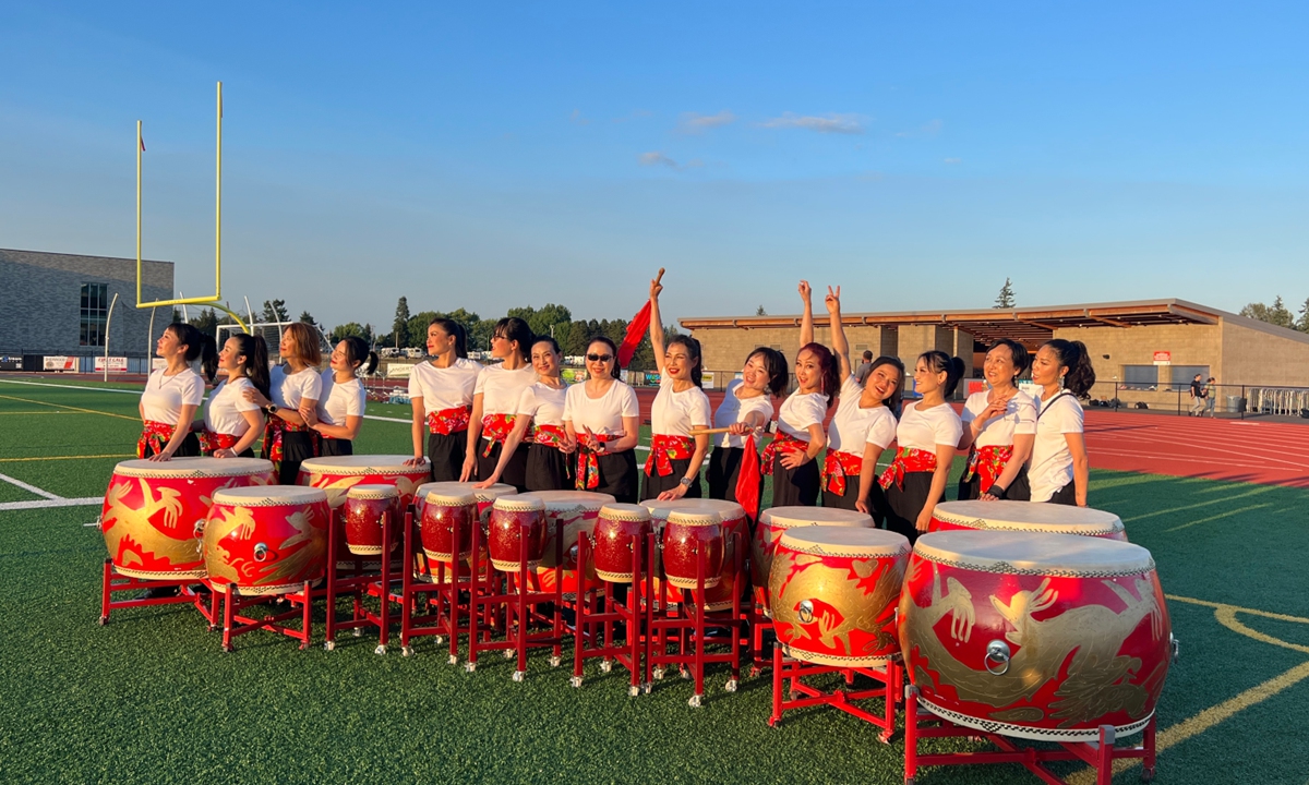 The Mulan drumline members perform in a high school in the US. Photo: Courtesy of Dong Wenzhu