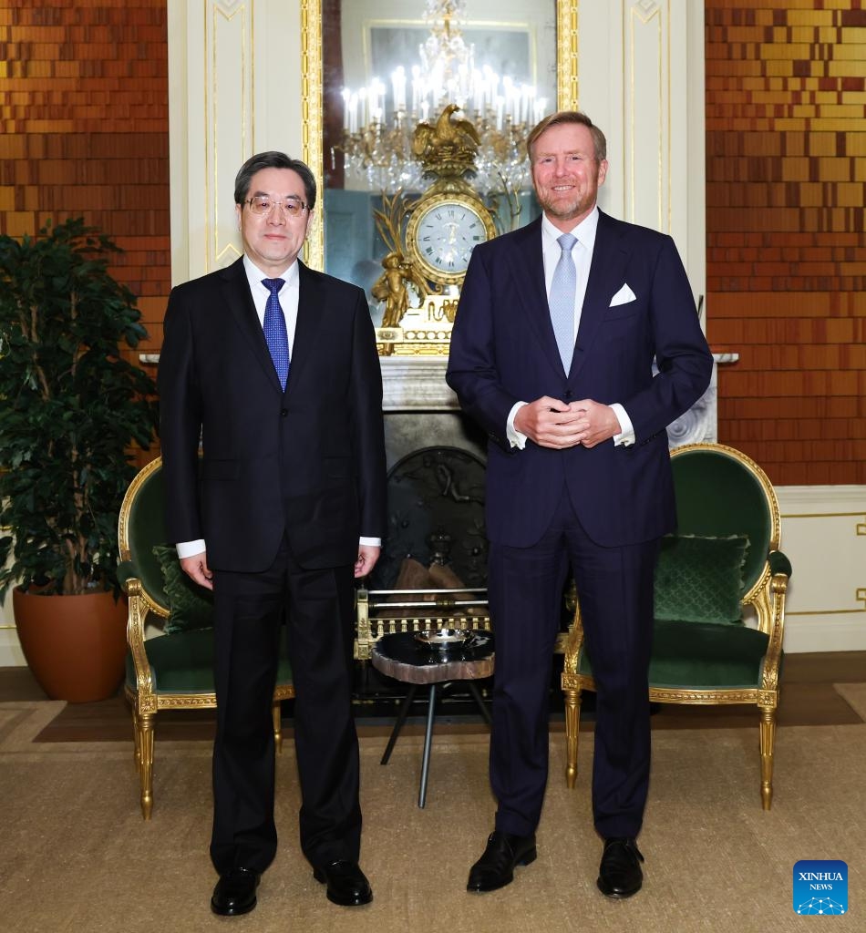 Chinese Vice Premier Ding Xuexiang, also a member of the Standing Committee of the Political Bureau of the Communist Party of China Central Committee, meets with Dutch King Willem-Alexander in The Hague, the Netherlands, Jan. 22, 2025. Ding visited the Netherlands from Jan. 22 to Jan. 23 at the invitation of the government of the Netherlands. (Xinhua/Huang Jingwen)