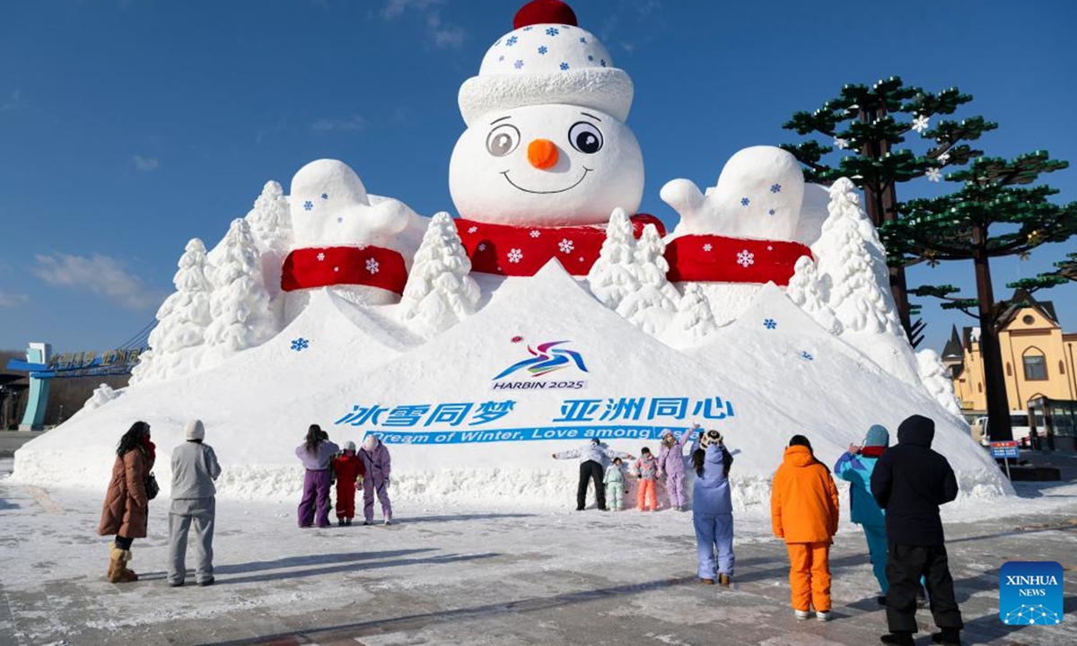 People visit the Yabuli Ski Resort along the Yaxue Road in Harbin, northeast China's Heilongjiang Province, Jan. 16, 2025. As part of national highway G333, Yaxue Road connects Harbin, Yabuli, and Snow Town, all of them iconic winter tourist attractions in northeast China, offering visitors the natural and cultural charm of the region. (Xinhua/Xie Jianfei)