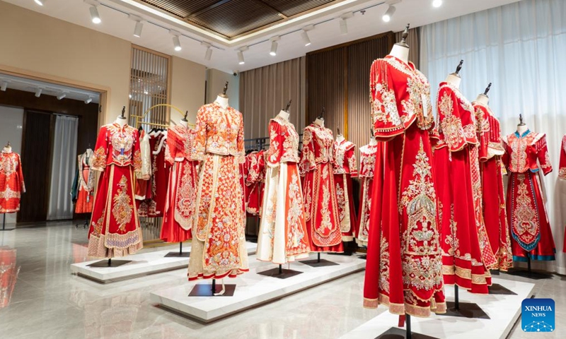 Traditional wedding dresses are seen at Dingji Town, in Lu'an City, east China's Anhui Province, Jan. 14, 2025. (Xinhua/Wang Haiyue)