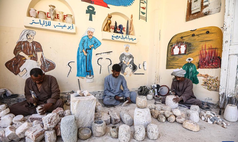 Artisans work on alabaster at a workshop in Luxor, Egypt, on Jan. 10, 2025. Amidst the ancient temples and tombs in Egypt's Luxor, skilled artisans continue to transform alabaster -- a luminous stone once cherished by pharaohs -- into breathtaking artworks, reviving the legacy of their ancestors. (Xinhua/Ahmed Gomaa)