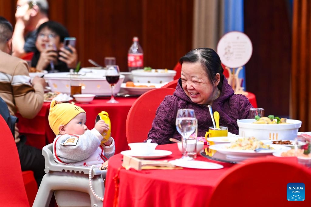 People have reunion meals at a restaurant in Nanning City, south China's Guangxi Zhuang Autonomous Region, Jan. 28, 2025. Dining with family members in a reunion meal has been a cherished tradition for the Chinese on the eve of the Spring Festival, which falls on Jan. 29 this year. (Photo: Xinhua)
