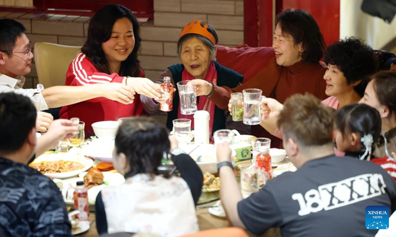 People have a reunion meal at a restaurant in Lanzhou City, northwest China's Gansu Province, Jan. 28, 2025. Dining with family members in a reunion meal has been a cherished tradition for the Chinese on the eve of the Spring Festival, which falls on Jan. 29 this year. (Photo: Xinhua)