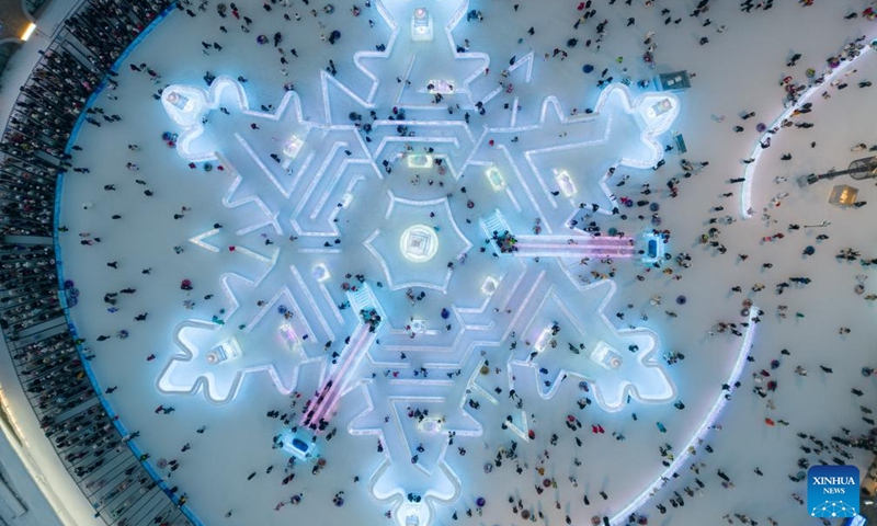 This aerial drone photo taken on Jan. 23, 2025 shows visitors playing at the Harbin Ice-Snow World in Harbin, northeast China's Heilongjiang Province. As the 9th Asian Winter Games (AWG) approaching, Harbin, known for its stunning ice sculptures and deep-rooted winter sports culture, is brimming with anticipation. As the city's iconic landmark, the Harbin Ice-Snow World, with this year's edition, the largest in its history, boasts 1 million square meters. The park shares its theme this year with the upcoming AWG to be held in Harbin: Dream of Winter, Love Among Asia. Harbin, which successfully hosted the 3rd AWG in 1996, is once again stepping onto the world stage. The whole city is under an upgrade to provide better services for winter sports lovers and tourists. Photo: Xinhua