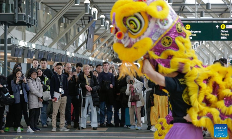 People watch a lion dance performance during the Chinese New Year celebration in the departure hall of Vancouver International Airport in Richmond, British Columbia, Canada, on Jan. 29, 2025. Photo: Xinhua