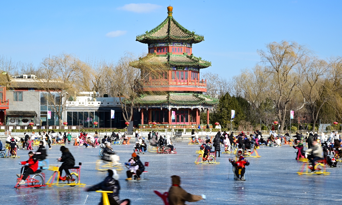Local residents and tourists ride ice sleds at the Shichahai Rink in the Xicheng district of Beijing, capital of China, on February 4, 2025, the last day of the Spring Festival holidays. Photo: VCG