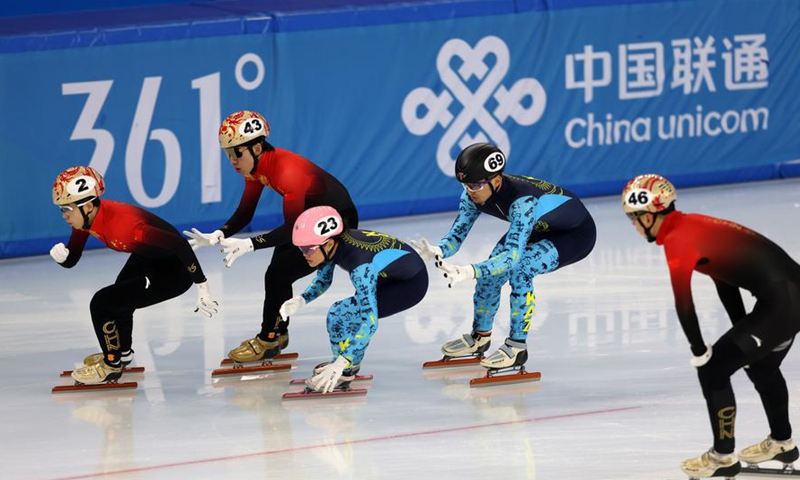 Fan Kexin (1st L) and Lin Xiaojun (2nd L) of China compete in the short track speed skating mixed 2,000m relay semifinal at the 9th Asian Winter Games in Harbin, northeast China's Heilongjiang Province, Feb. 7, 2025. (Xinhua/Ding Xu)