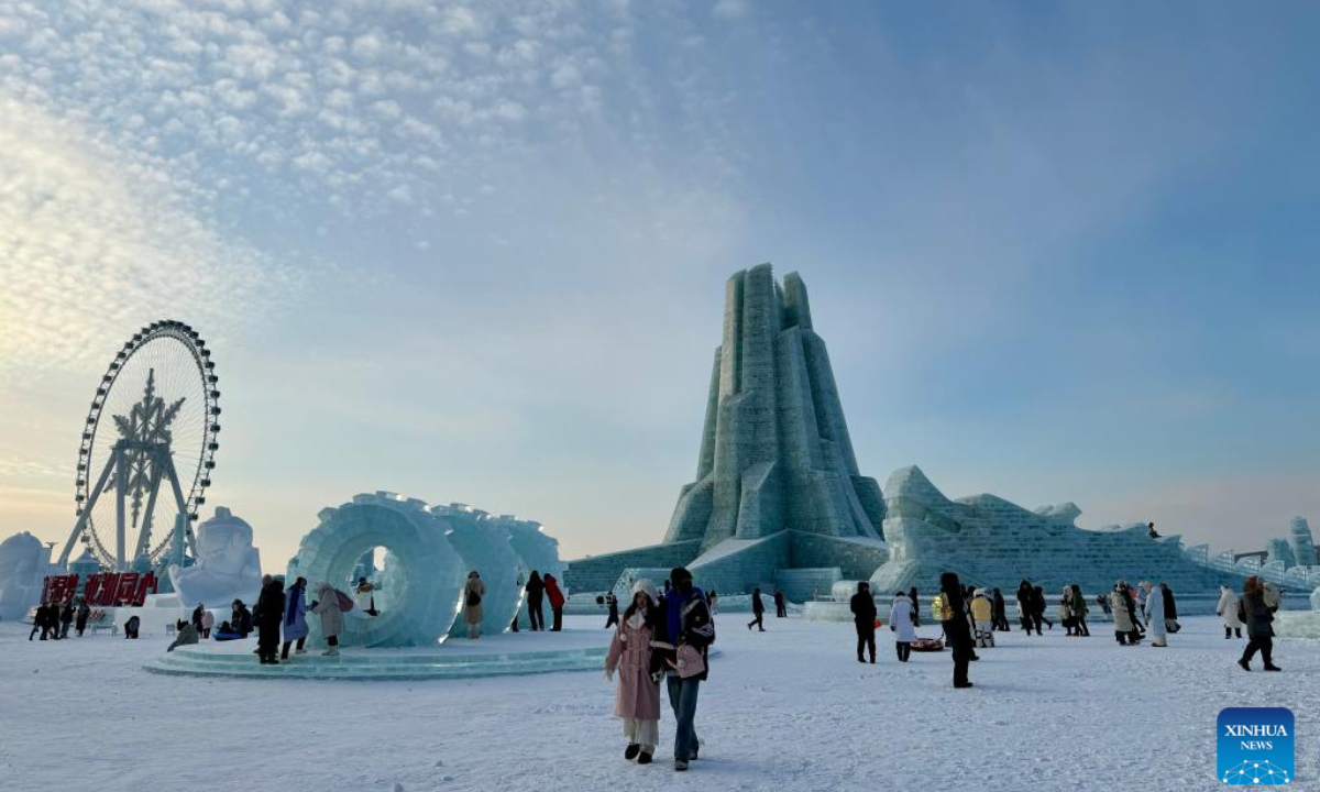 Tourists visit the Harbin Ice-Snow World, the world's largest ice-and-snow theme park, in Harbin, the capital city of northeast China's Heilongjiang Province, Dec. 21, 2024. (Xinhua/Yang Siqi)