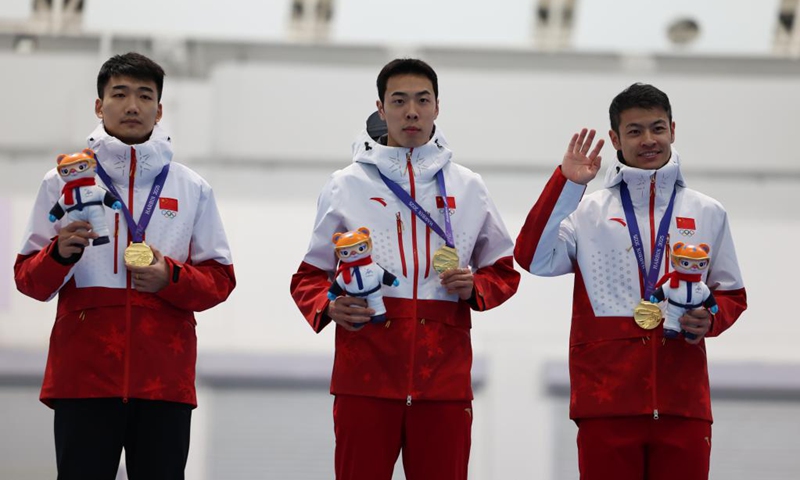 Gao Tingyu (L), Lian Ziwen (C) and Ning Zhongyan of China pose during the awarding ceremony after the men's team sprint final match of the speed skating event at the 9th Asian Winter Games in Harbin, northeast China's Heilongjiang Province, Feb. 10, 2025. Photo: Xinhua