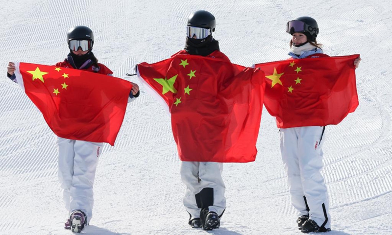 Liu Mengting (C), Yang Ruyi (R) and Han Linshan of China celebrate after the women's freeski slopestyle final at the 9th Asian Winter Games in Yabuli, northeast China's Heilongjiang Province, Feb. 11, 2025. Photo: Xinhua
