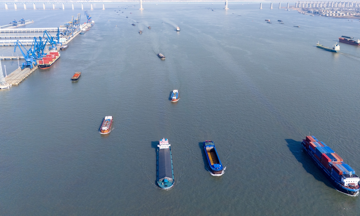 Ships carrying various production and living materials sail in the waters of the Yangtze River in Nantong, East China's Jiangsu Province on February 13, 2025. Factories across China have gradually resumed operations as the country's most celebrated holiday, the Spring Festival ends. Photo: VCG