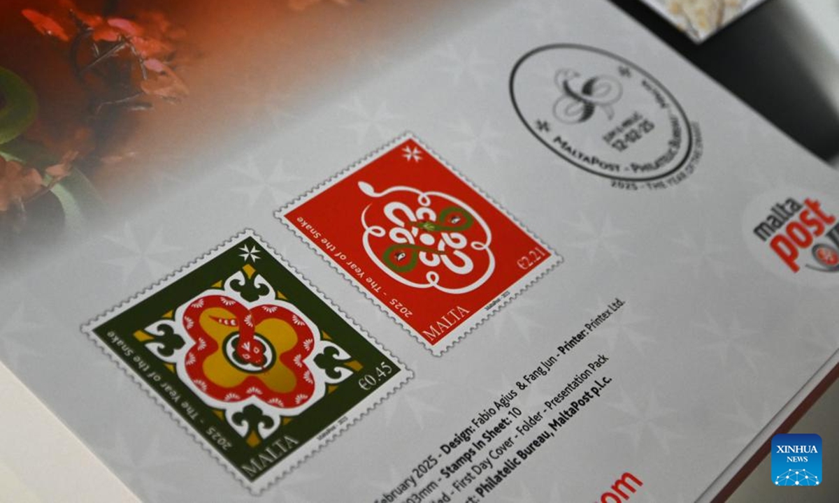Photo taken on Feb. 12, 2025 shows a set of newly released Year of the Snake zodiac postage stamps in Valletta, Malta. MaltaPost unveiled these stamps here on Wednesday, marking the second consecutive year the country has issued stamps celebrating the Chinese Lunar New Year.

The newly released set of two stamps, designed by Maltese artist Fabio Agius and Chinese designer Fang Jun, showcases a unique blend of Maltese and Chinese cultural motifs. (Photo by Jonathan Borg/Xinhua)