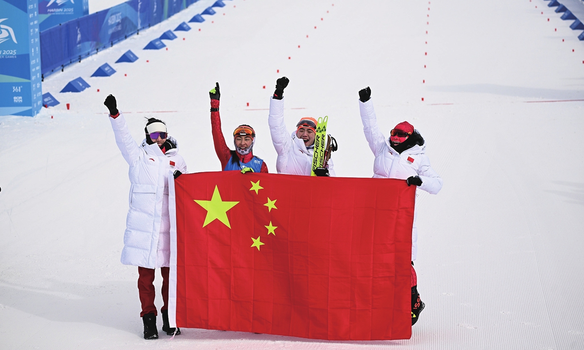From left: Chinese athletes, Tang Jialin, Wen Ying, Chu Yuanmeng, and Meng Fanqi celebrate after winning the biathlon women's 4x6km relay at the Harbin Asian Winter Games on February 13, 2025. Photo: VCG