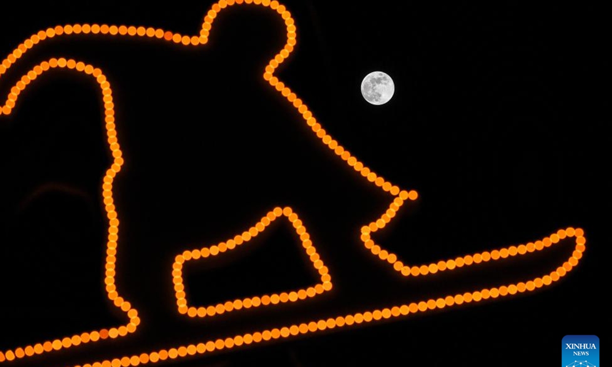 The moon is seen over Yabuli, northeast China's Heilongjiang Province, Feb. 12, 2025. (Xinhua/Lian Zhen)