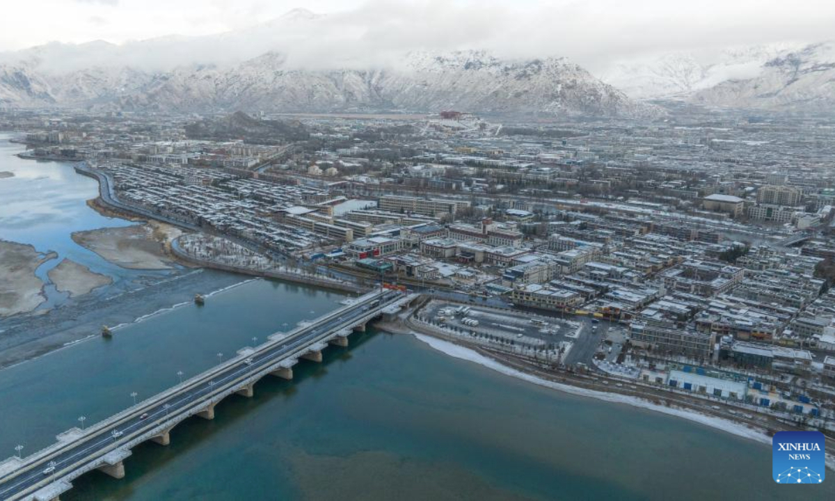 An aerial drone photo taken on Feb. 16, 2025 shows the snow scenery of the Potala Palace in Lhasa, southwest China's Xizang Autonomous Region. (Xinhua/Tenzin Nyida)