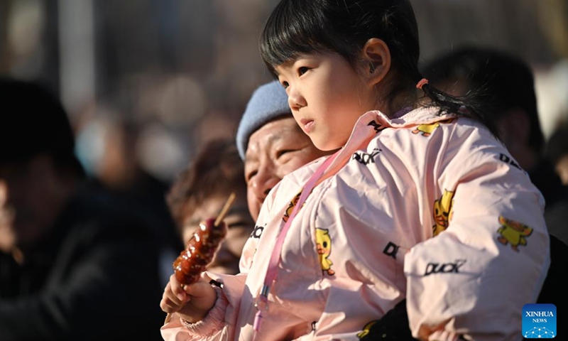 People watch performance during a memorial ceremony for Chinese sea goddess Mazu in north China's Tianjin Municipality, Feb. 13, 2025. Gegu Baonianhui, a memorial ceremony for Chinese sea goddess Mazu observed in Gegu Township, was staged on Thursday in Tianjin. This memorial ceremony was included in national intangible cultural heritage list in 2014. It is an important activity for the locals to celebrate the Chinese New Year and pray for good luck. (Photo: Xinhua)