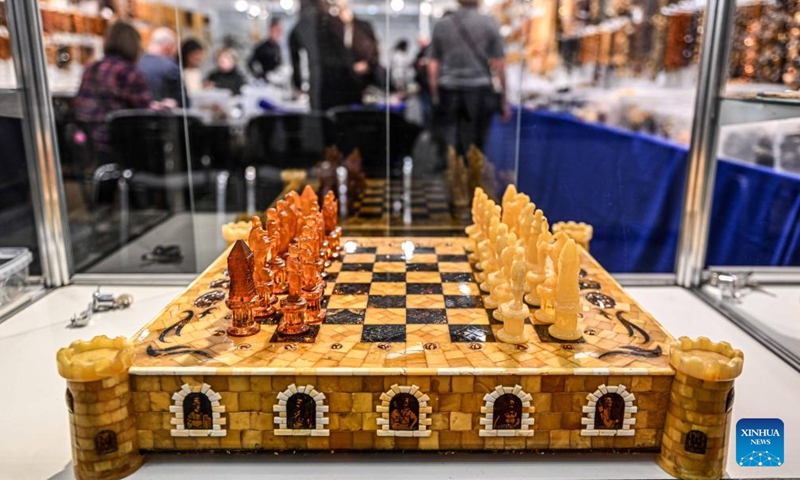 Photo taken on Feb. 13, 2025 shows amber products at the International Baltic Jewelry Show in Vilnius, Lithuania. The 21st International Baltic Jewelry Show titled Amber Trip kicked off here in Vilnius on Thursday. (Photo: Xinhua)