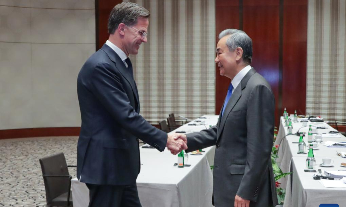 Chinese Foreign Minister Wang Yi, also a member of the Political Bureau of the Communist Party of China Central Committee, meets with Secretary General of the North Atlantic Treaty Organization (NATO) Mark Rutte on the sidelines of the Munich Security Conference, in Munich, Germany, Feb. 14, 2025. (Xinhua/Zhang Fan)
