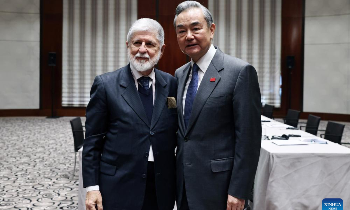 Chinese Foreign Minister Wang Yi, also a member of the Political Bureau of the Communist Party of China Central Committee, meets with Celso Amorim, special advisor to the president of Brazil, on the sidelines of the Munich Security Conference in Munich, Germany, Feb. 15, 2025. (Xinhua/Gao Jing)