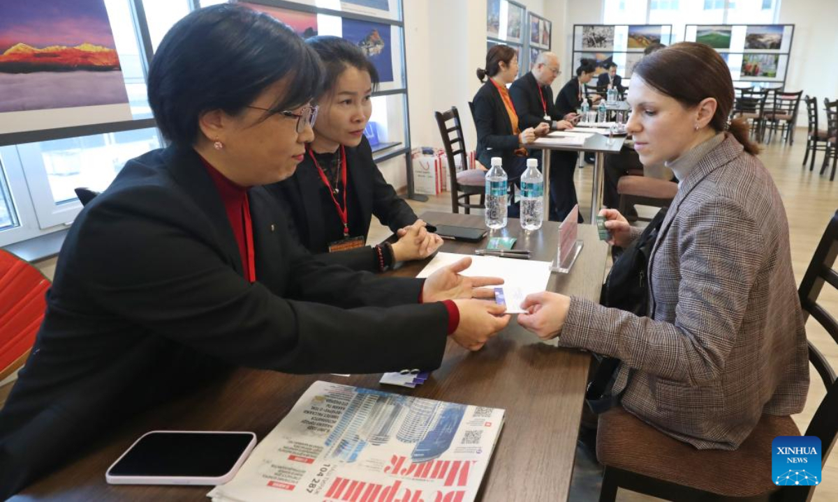 Representatives of travel agencies from China and Belarus negotiate business at a tourism workshop in Minsk, Belarus, Feb. 19, 2025. The Chinese Embassy in Belarus and the Ministry of Sports and Tourism of Belarus have co-hosted a workshop for tour operators at the Chinese Cultural Center in Minsk.

The event on Wednesday brought together representatives from about 30 travel agencies and airlines from China and Belarus to explore opportunities for tourism and cultural collaboration. (Photo by Henadz Zhinkov/Xinhua)