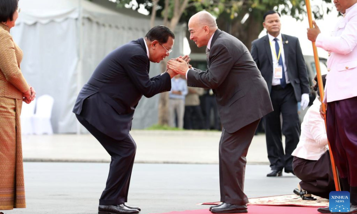 Cambodian King Norodom Sihamoni (R) is greeted by Cambodian Senate President Samdech Techo Hun Sen in Phnom Penh, Cambodia on Feb. 17, 2025. (Photo by Sovannara/Xinhua)