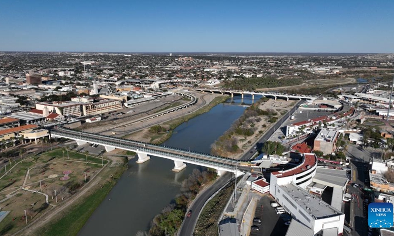 This aerial drone photo taken on Feb. 16, 2025 in Nuevo Laredo, Tamaulipas, Mexico shows an international bridge between Mexico (R) and the United States. The Mexico and the U.S. share a borderline of over 3,100 kilometers, with the eastern section primarily defined by the Rio Grande River. (Photo: Xinhua)