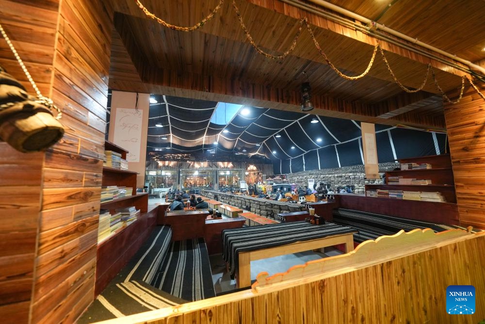 This photo taken on Feb. 13, 2025 shows a Tibetan-style teahouse in Seni District of Nagqu, southwest China's Xizang Autonomous Region. Covering an area of around 1,200 square meters, the Tibetan-style teahouse presents customers with both Tibetan delicacies and immersive experiences of folklore culture. Displaying over 3,000 pieces of traditional Tibetan folk artifacts, the teahouse offers a lens through which people can learn about the nomadic life in northern Xizang. (Photo: Xinhua)