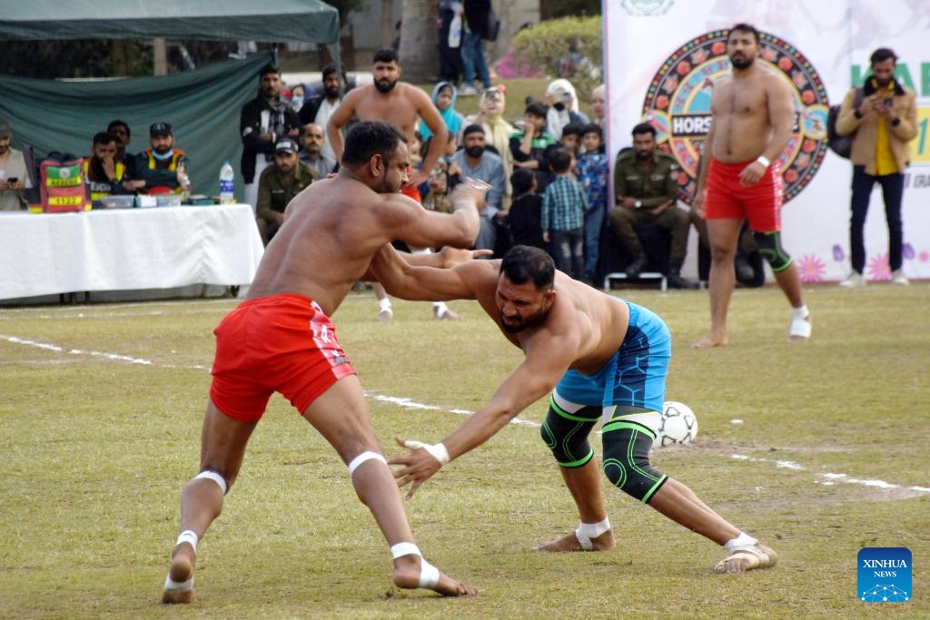 People compete in a Kushti match in Lahore, Pakistan, Feb. 18, 2025. Pehlwani wrestling, also known as Kushti, is a traditional competitive sport which was developed in the Mughal era. It is popular in South Asian countries. (Photo: Xinhua)