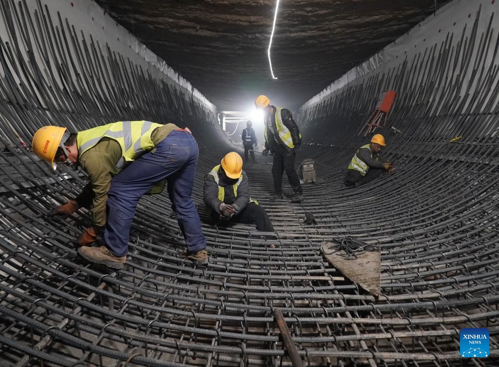 Workers carry out construction at the site of Hongmiao Station on Beijing Subway line 22 in Beijing, capital of China, Feb. 19, 2025. The line 22 is the first cross-provincial intercity metro between Beijing and Hebei Province, with a total length of approximately 81 kilometers.