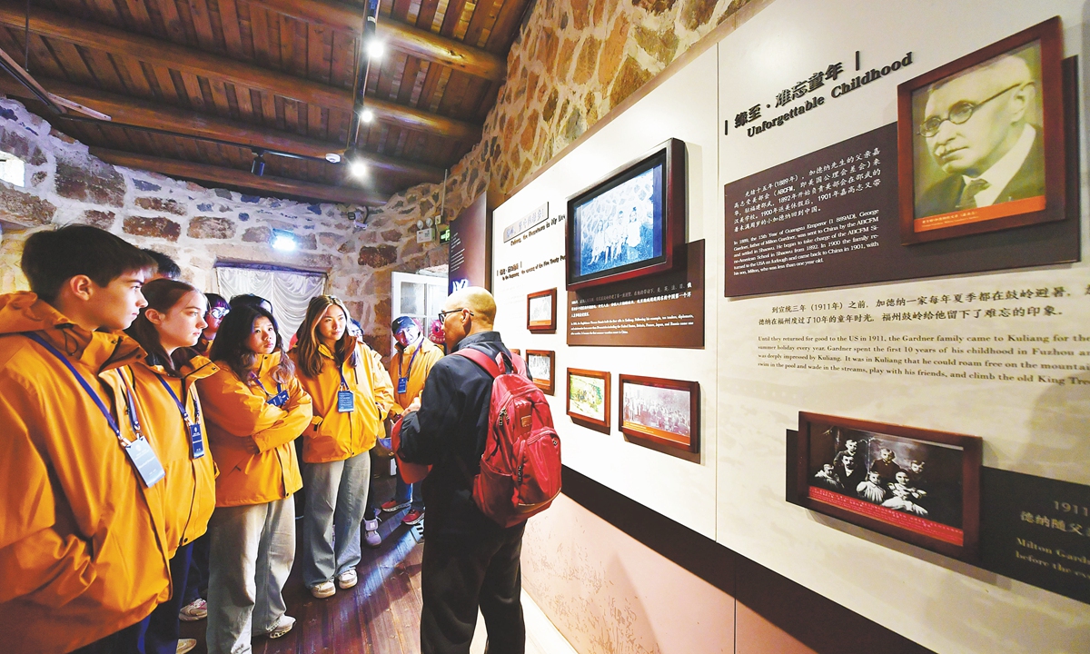 A group of American youths visit Kuliang in Fuzhou city, Southeast China's Fujian Province, and learn about the century-old story of Kuliang, which used to be a hillside resort among foreign expatriates, on December 27, 2024. Photo: VCG