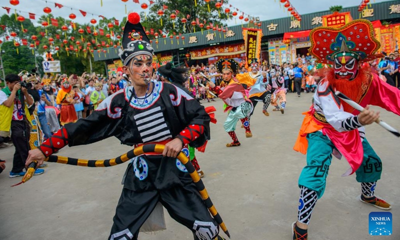 Members of Yingge teams from China and Malaysia perform during a parade in Johor, Malaysia, Feb. 18, 2025. Yingge teams from China and Malaysia staged Yingge dances during a parade here on Tuesday, attracting lots of audience on the spot. (Photo: Xinhua)