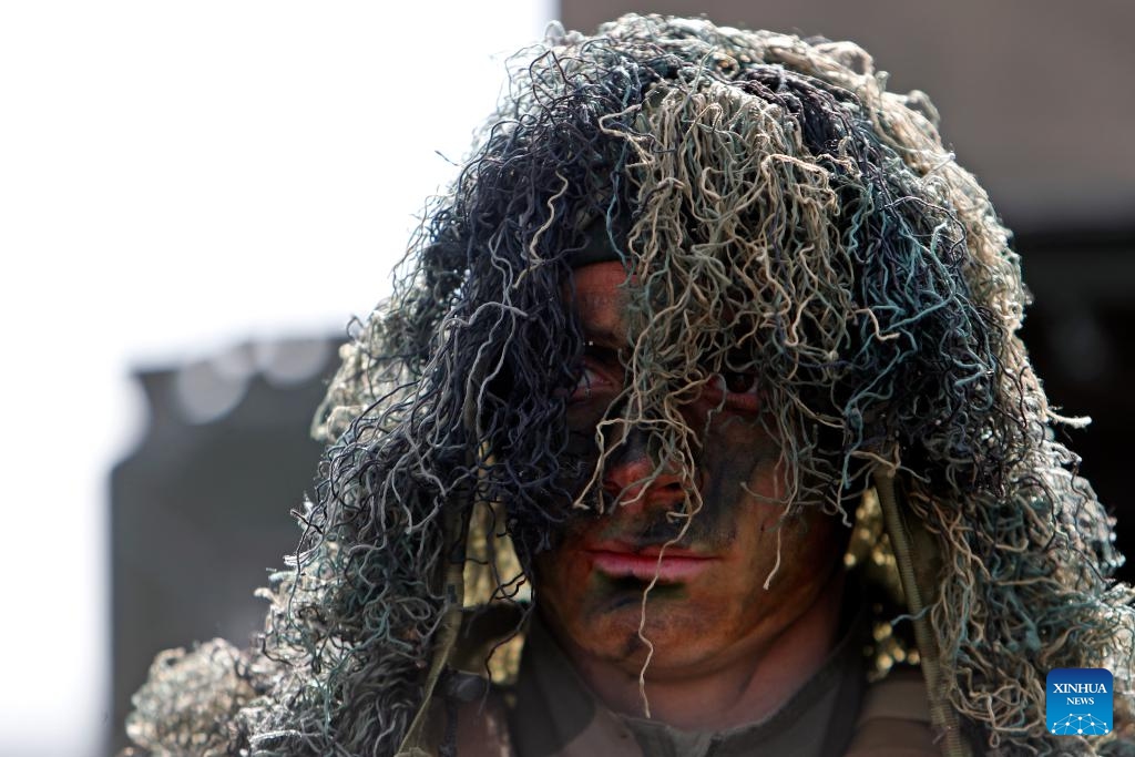 A French paratrooper participates in NATO's Steadfast Dart 2025 exercise at a training range in Smardan, Romania, on Feb. 19, 2025. (Photo: Xinhua)