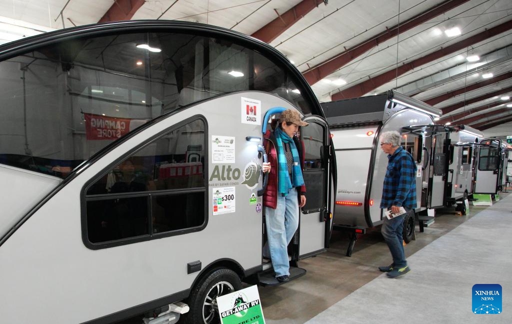 People visit the 2025 Earlybird RV Show and Sale in Abbotsford, British Columbia, Canada, Feb. 20, 2025. Featuring over 200 recreational vehicles (RVs) from 45 exhibitors across North America, this annual event is held here from Feb. 20 to Feb. 23. (Photo: Xinhua)