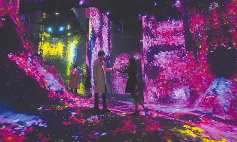 A consumer poses with her favorite 