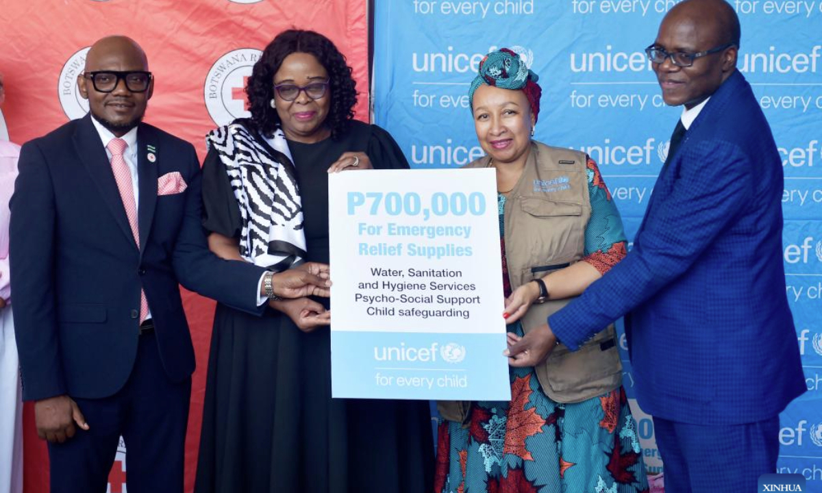 Nono Kgafela Mokoka (2nd L), Botswanan minister of child welfare and basic education, receives donation from Joan Matji (2nd R), UNICEF's country representative to Botswana, during a donation ceremony in Gaborone, Botswana, on Feb. 26, 2025. The United Nations Children's Fund (UNICEF) on Wednesday provided 700,000 pula (about 50,772 U.S. dollars) in emergency aid to Botswana's Ministry of Child Welfare and Basic Education to help vulnerable children affected by the recent floods. (Photo by Tshekiso Tebalo/Xinhua)
