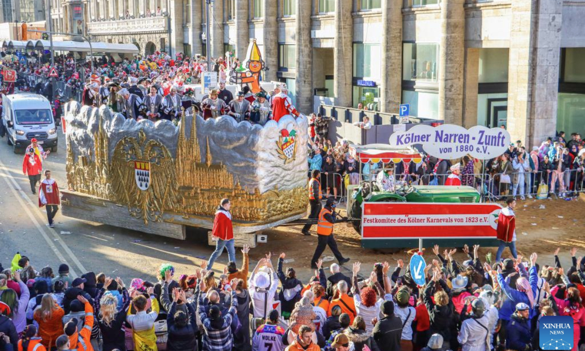 Revelers take part in the Rose Monday carnival parade in Cologne, Germany, March 3, 2025. Rose Monday is the biggest one of its kind held during the annual carnival season in this city of historical heritages. (Xinhua/Zhang Fan)