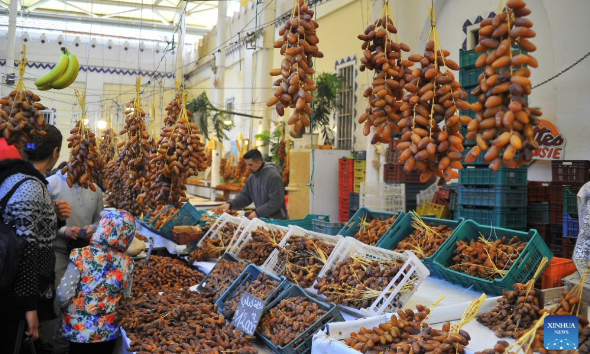 Tunisians buy food for the Iftar meal at a market in Tunis, Tunisia on March 1, 2025. Tunisia entered Ramadan on March 1. (Photo by Adel Ezzine/Xinhua)