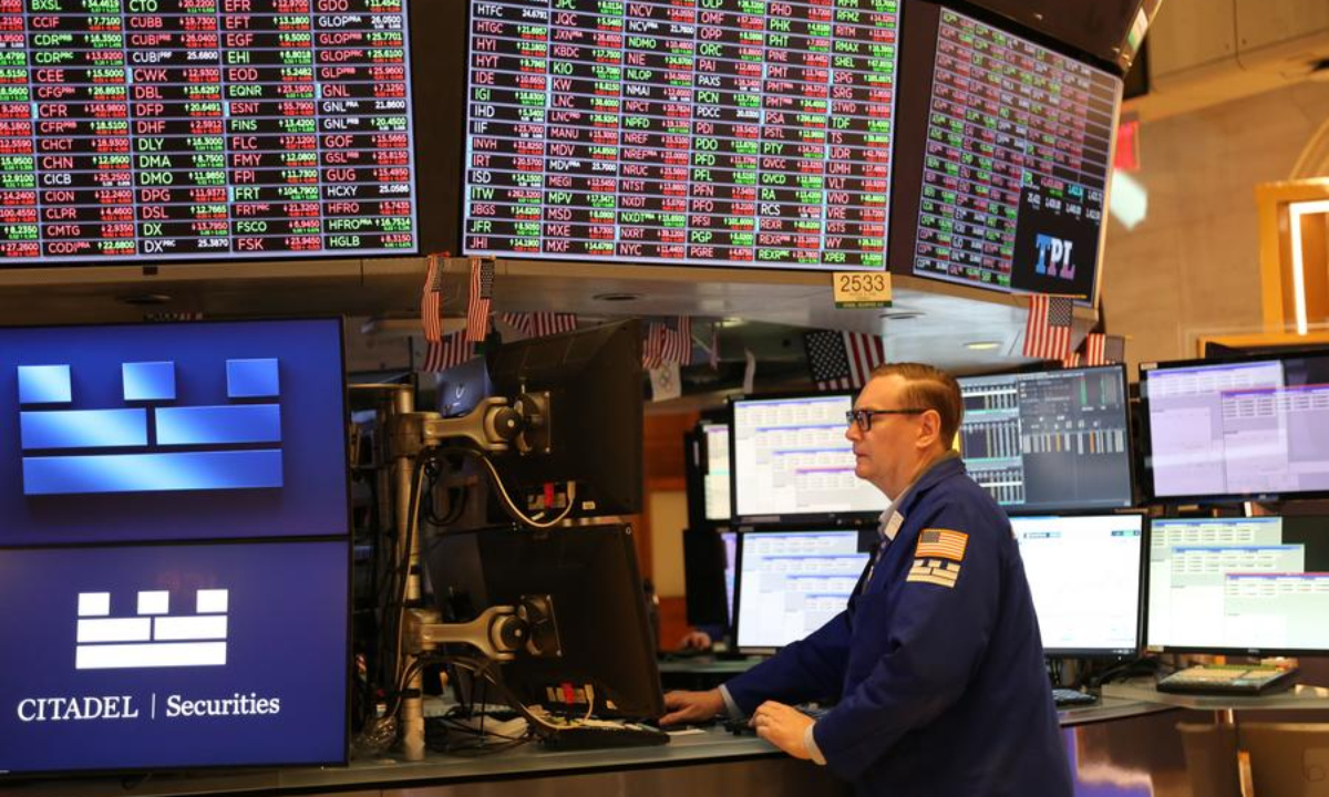 A trader works on the floor of the New York Stock Exchange in New York, the United States, on Feb. 19, 2025. (Xinhua/Liu Yanan)