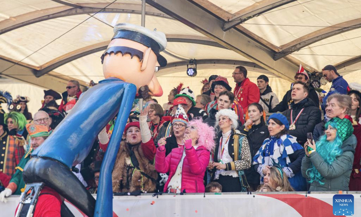 Revelers take part in the Rose Monday carnival parade in Cologne, Germany, March 03, 2025. Rose Monday is the biggest one of its kind held during the annual carnival season in this city of historical heritages. (Xinhua/Zhang Fan)