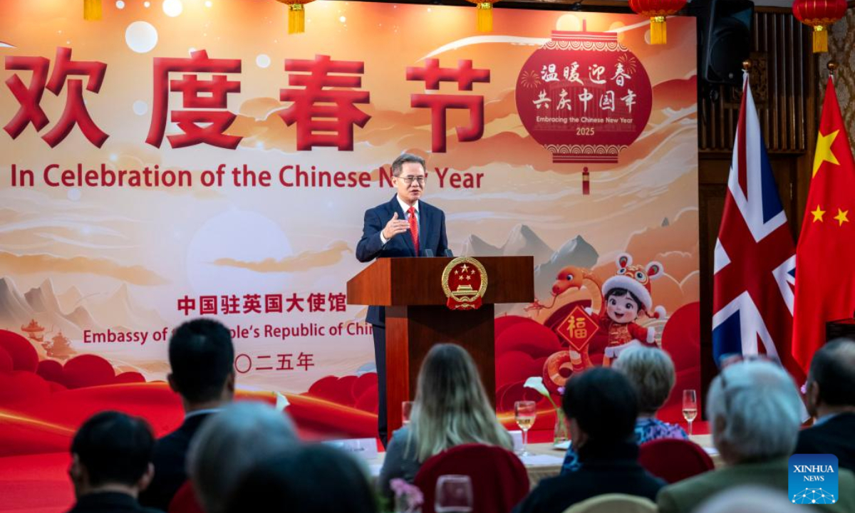 Chinese Ambassador to the United Kingdom (UK) Zheng Zeguang addresses a reception for the families of the Lisbon Maru survivors in London, Britain, on Feb. 22, 2025. The Chinese Embassy in the UK hosted a special reception in London on Saturday for the families of the Lisbon Maru survivors, commemorating the heroic rescue during World War II and celebrating the Spring Festival. (Photo by Stephen Chung/Xinhua)