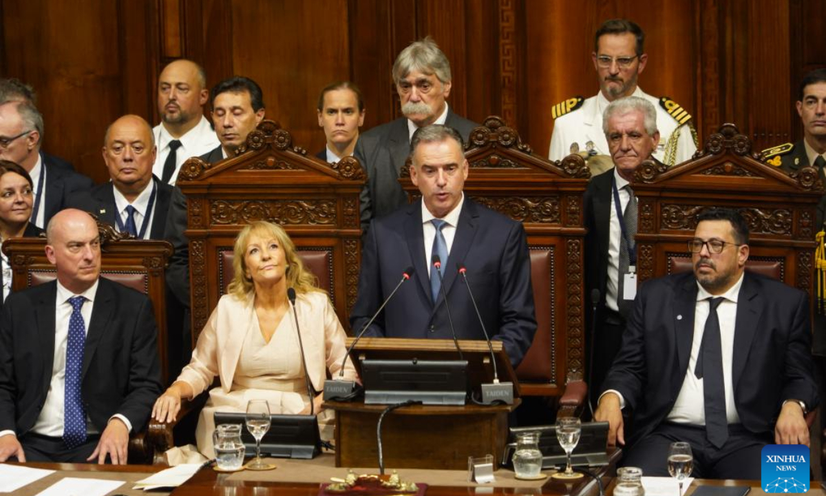 Uruguay's President-elect Yamandu Orsi (C) delivers a speech in the parliament in Montevideo, Uruguay, March 1, 2025. Yamandu Orsi was sworn in Saturday as Uruguayan president for a five-year term. (Xinhua/Zhang Duo)