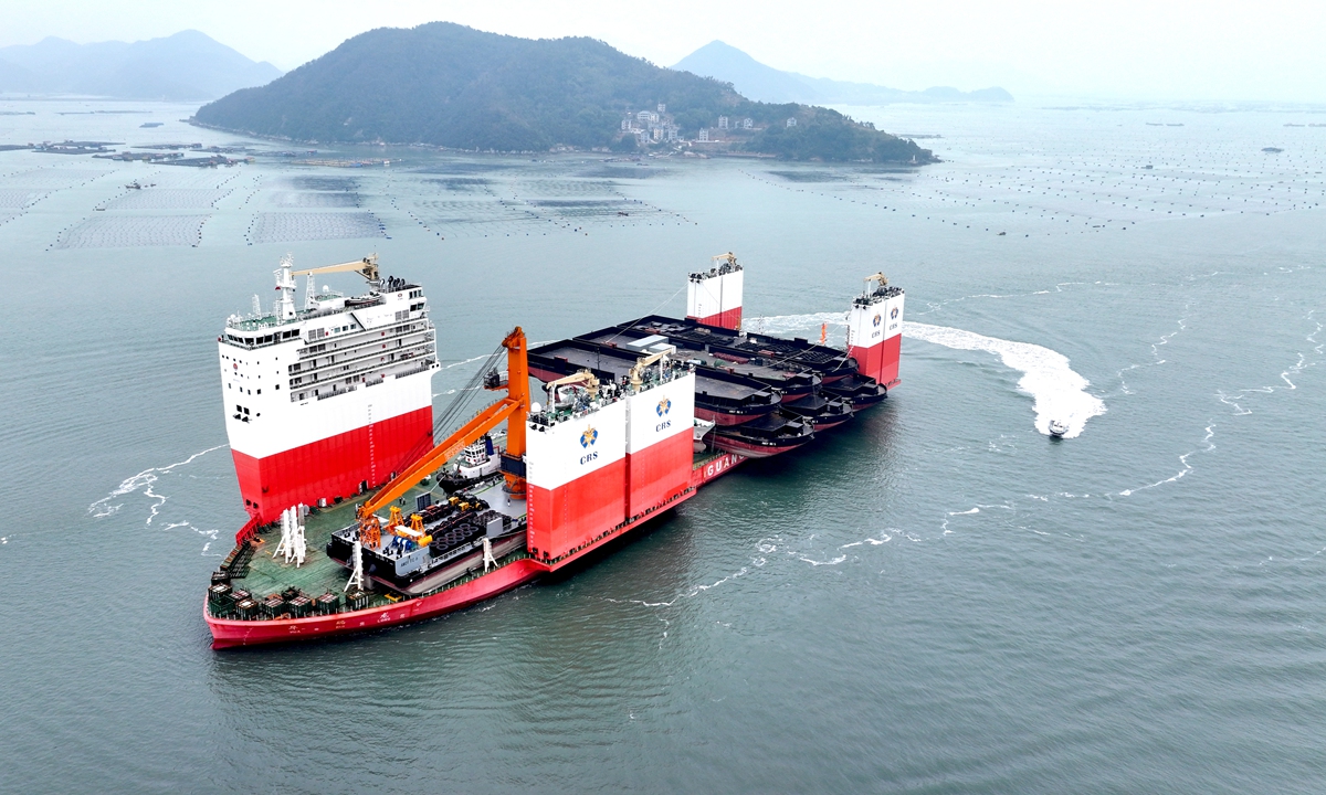Huaruilong, the world's third-largest semisubmersible ship, docks at Sanduao of Ningde, Southeast China's Fujian Province on February 26, 2025, about to set sail for Guinea. The vessel has a total length of 252 meters, a width of 60 meters and a height of 14.8 meters. It can achieve a maximum speed of 15 nautical miles (27.78 kilometers) per hour. Photo: VCG