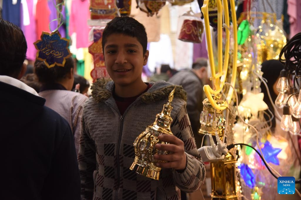 A boy shows a decoration for the upcoming holy month of Ramadan in Tripoli, Lebanon, on Feb. 26, 2025. (Photo: Xinhua)