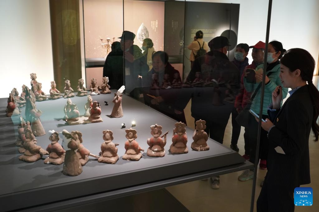 Tourists visit a relics museum inside the Xi'an Xianyang International Airport in Xi'an, northwest China's Shaanxi Province, Feb. 26, 2025. A museum for cultural relics unearthed at different phases during the construction of Xi'an Xianyang International Airport, the largest one of its kind in northwest China, opened to the public at the airport on Wednesday. (Photo: Xinhua)