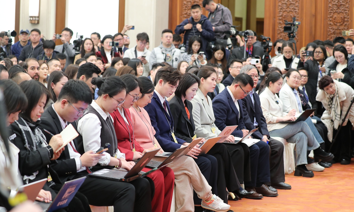 Journalists work at a press conference on the third session of the 14th Chinese People's Political Consultative Conference (CPPCC) National Committee at the Great Hall of the People in Beijing, capital of China, on March 3, 2025. China's top political advisory body, the CPPCC National Committee, will hold its annual session from March 4 to 10 in Beijing. Photo: VCG